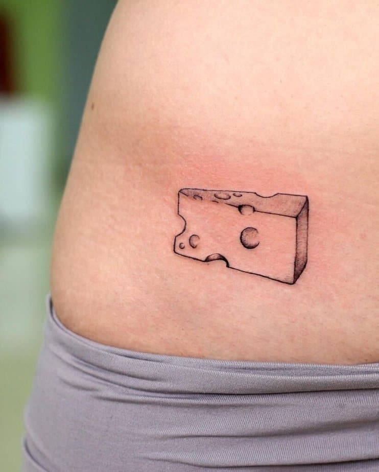 14. Ein Käse-Tattoo auf dem Bauch