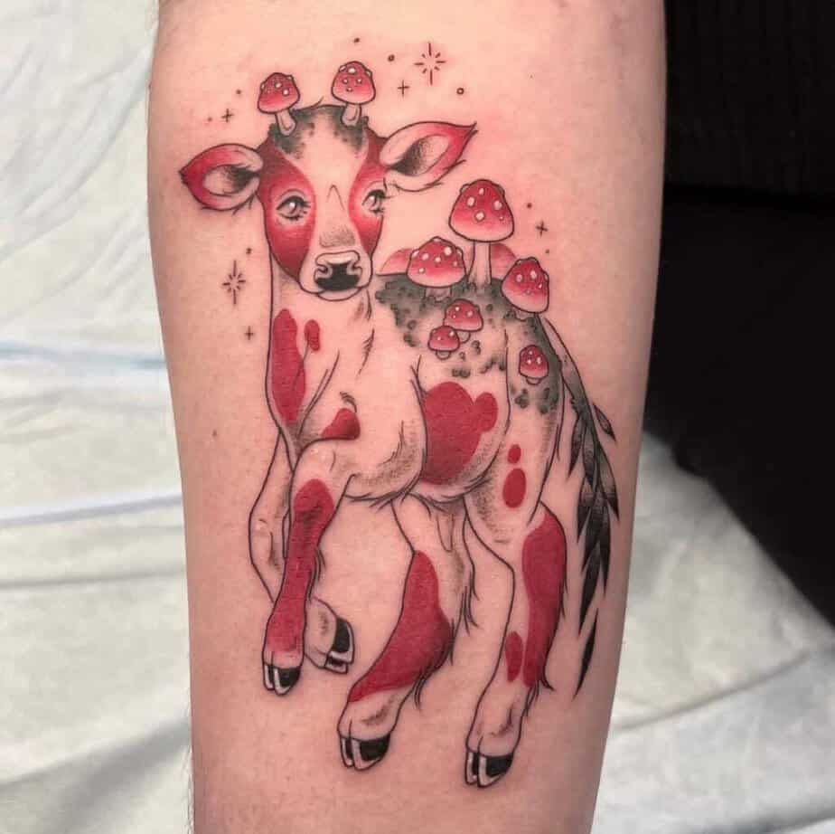 21. Ein Pilz-Kuh-Tattoo