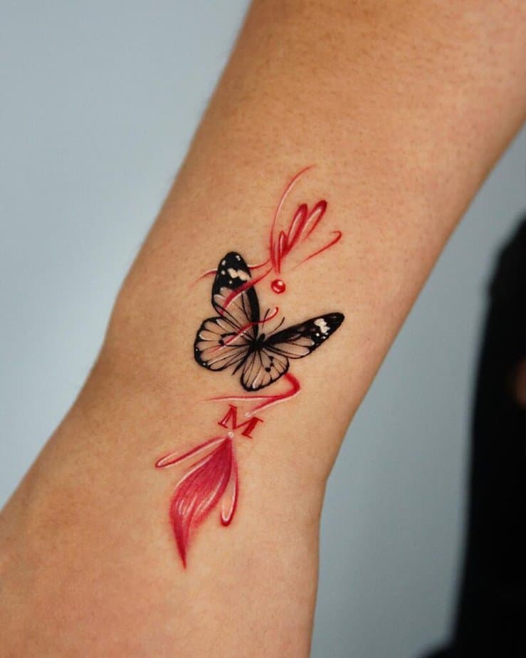 12. Ein Schmetterling Hand "norigae" Tätowierung 
