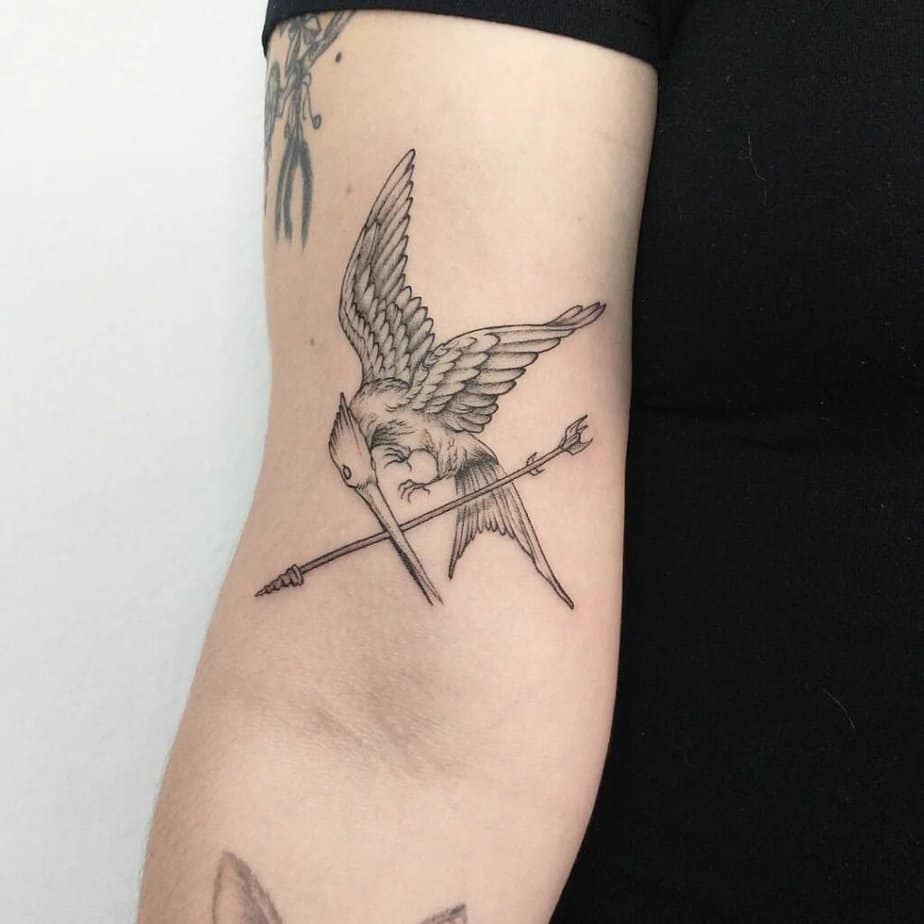 15. Ein Hunger Games-Tattoo auf der Innenseite des Arms 