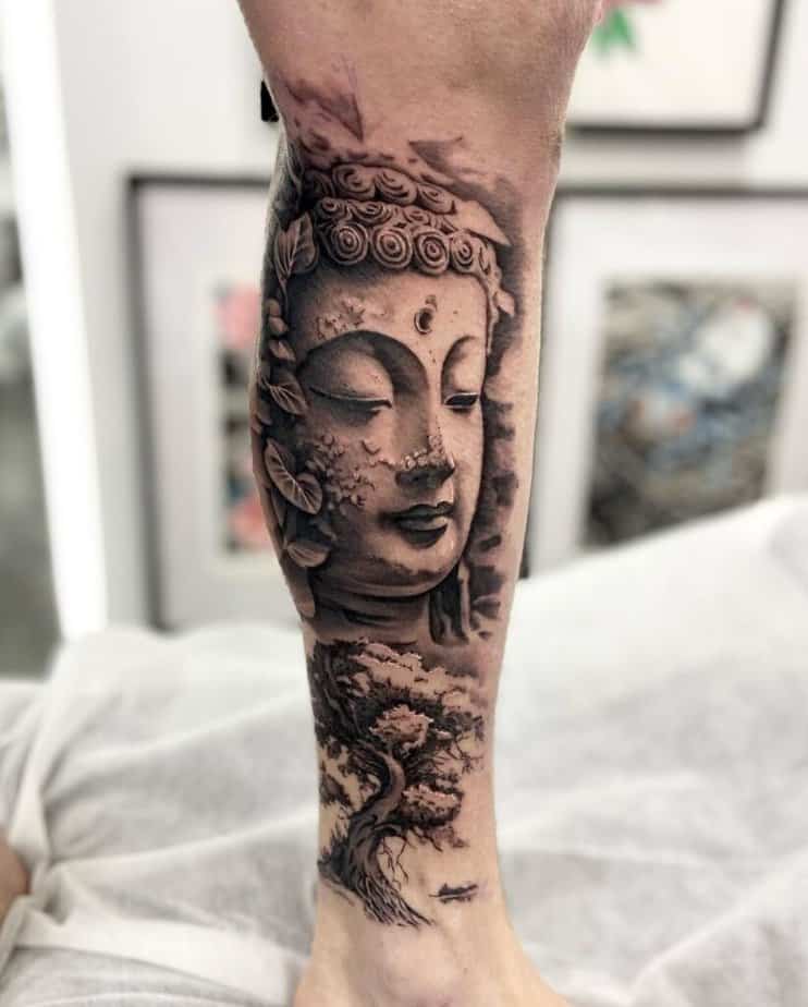 3. Eine Buddha-Tätowierung auf dem Bein