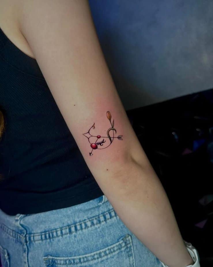 22. Ein Schütze-Tattoo auf der Rückseite des Arms