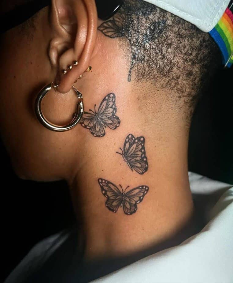 16. Ein weiteres Tattoo mit drei schwarz-weißen Schmetterlingen 