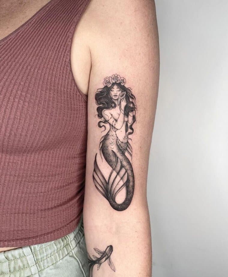 4. Eine schöne und mutige Meerjungfrau Tattoo 