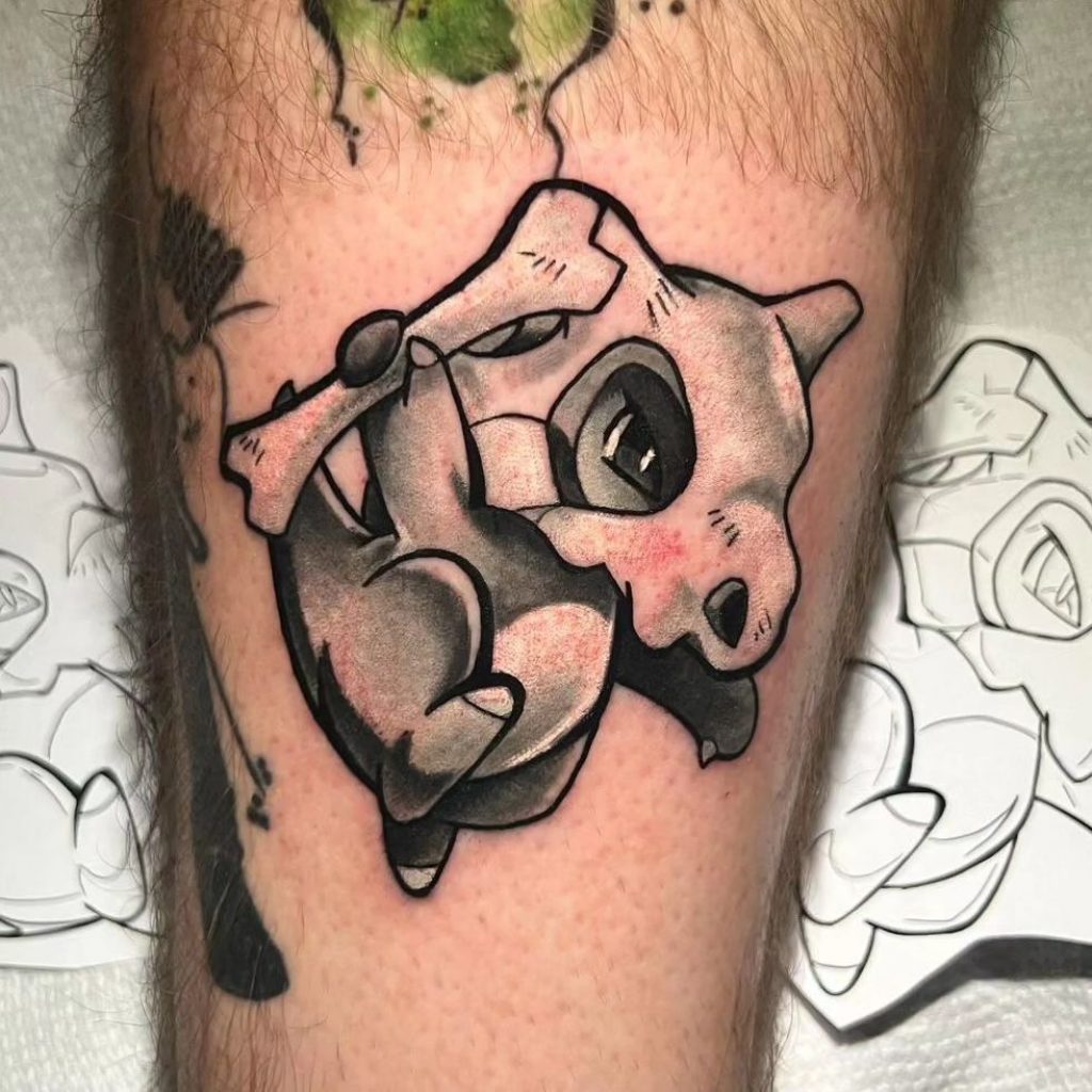 Schwarze und graue Pokémon-Tattoos
