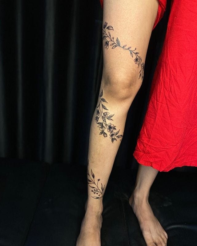 Stunning flower leg tattoo