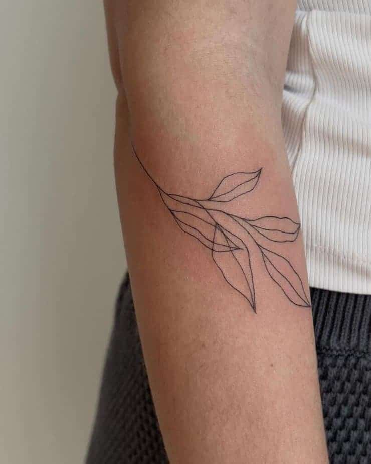 18. Ein liniertes Blatt-Tattoo auf dem Unterarm