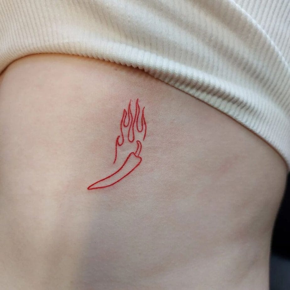 10. Ein Tattoo mit einer brennenden Chilischote