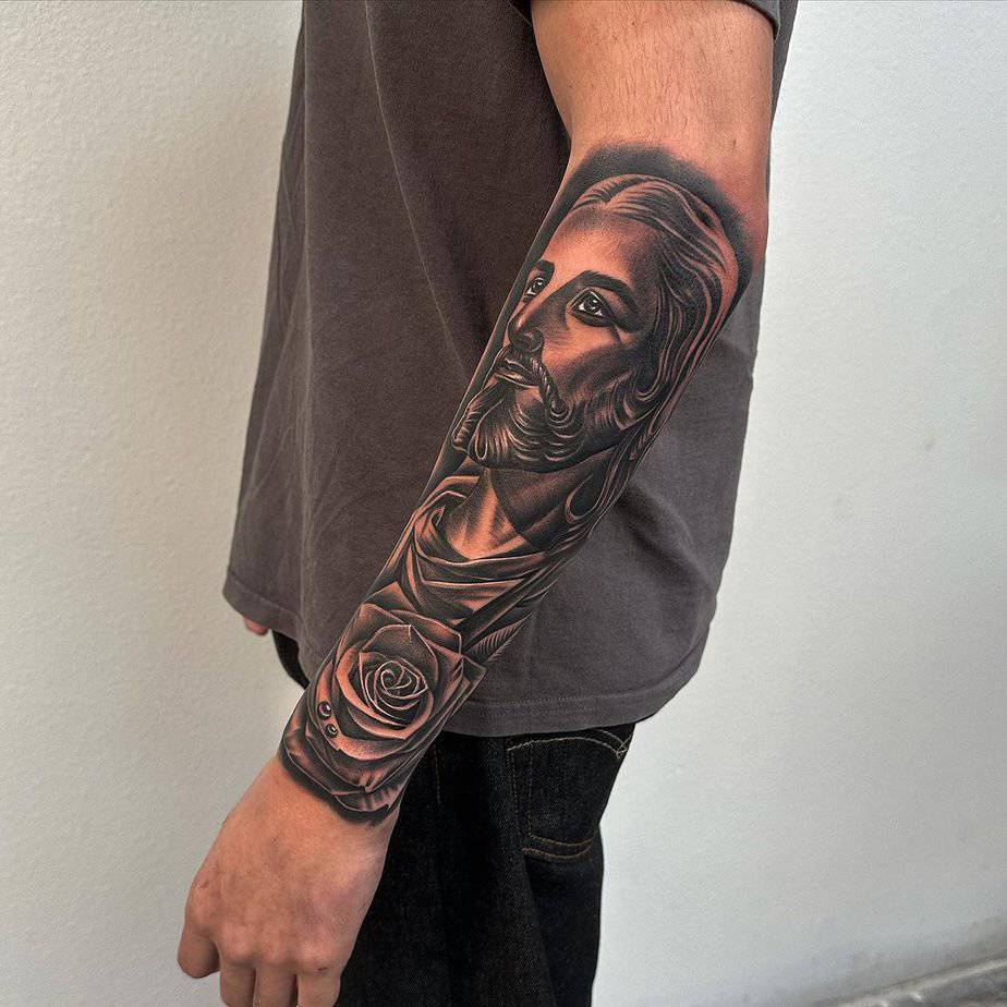 18. Jesus Tattoo auf dem Unterarm