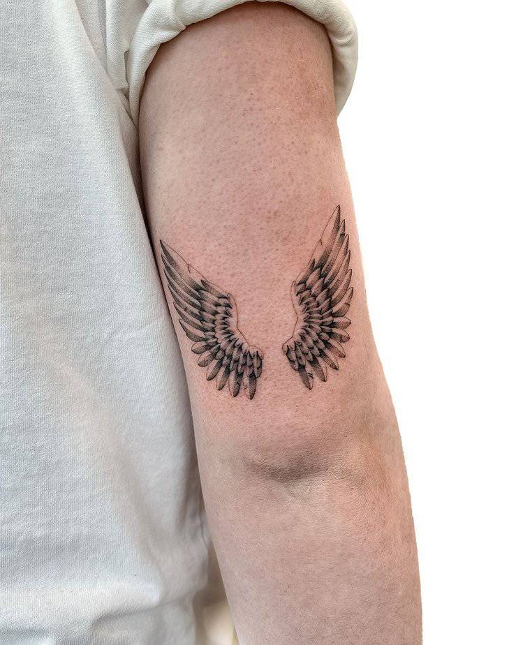 12. Schönes Flügel-Arm-Tattoo
