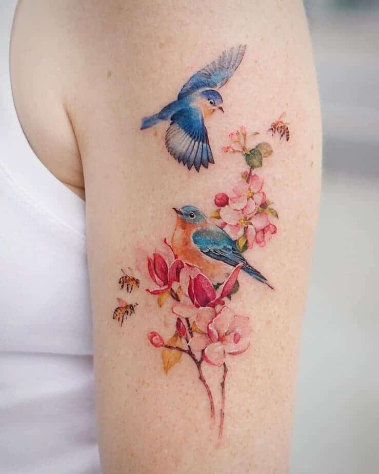 17. Blaue Vögel zwischen Kirschblüten