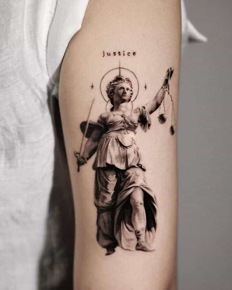 8. Lady Justice Tattoo