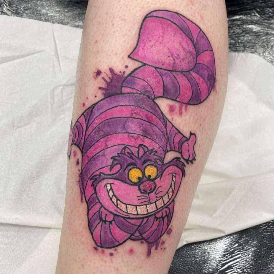 2. Rosa Cheshire Cat Tattoo