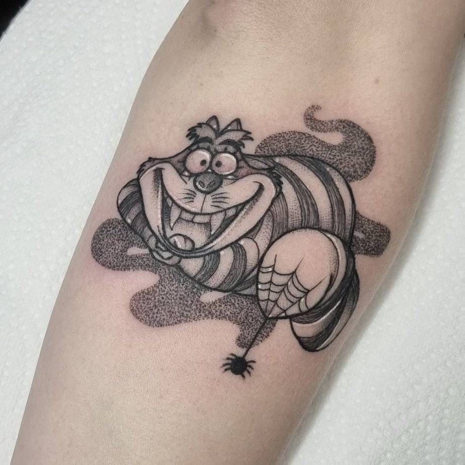 13. Spooky Cheshire Cat Tattoo