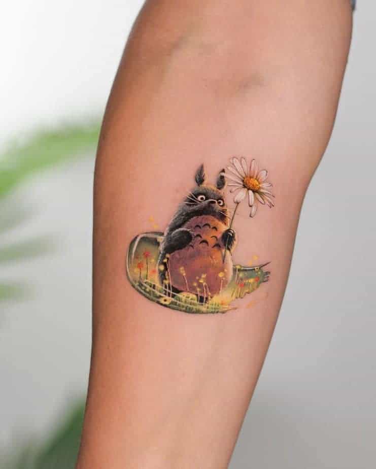 20. Totoro mit einer Blume