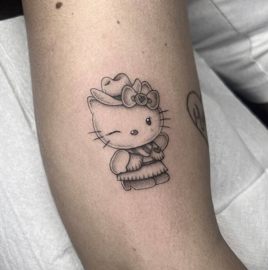 7. Cowgirl Hello Kitty Tattoo