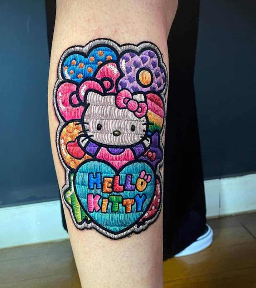 12. Gesticktes Hello Kitty Tattoo