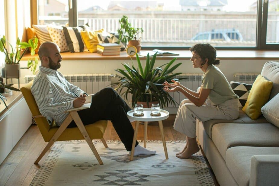 Emotional woman talking to her therapist.